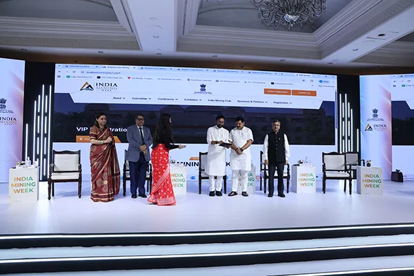 Delegates checking in at the India Mining Week 2026 exhibition floor